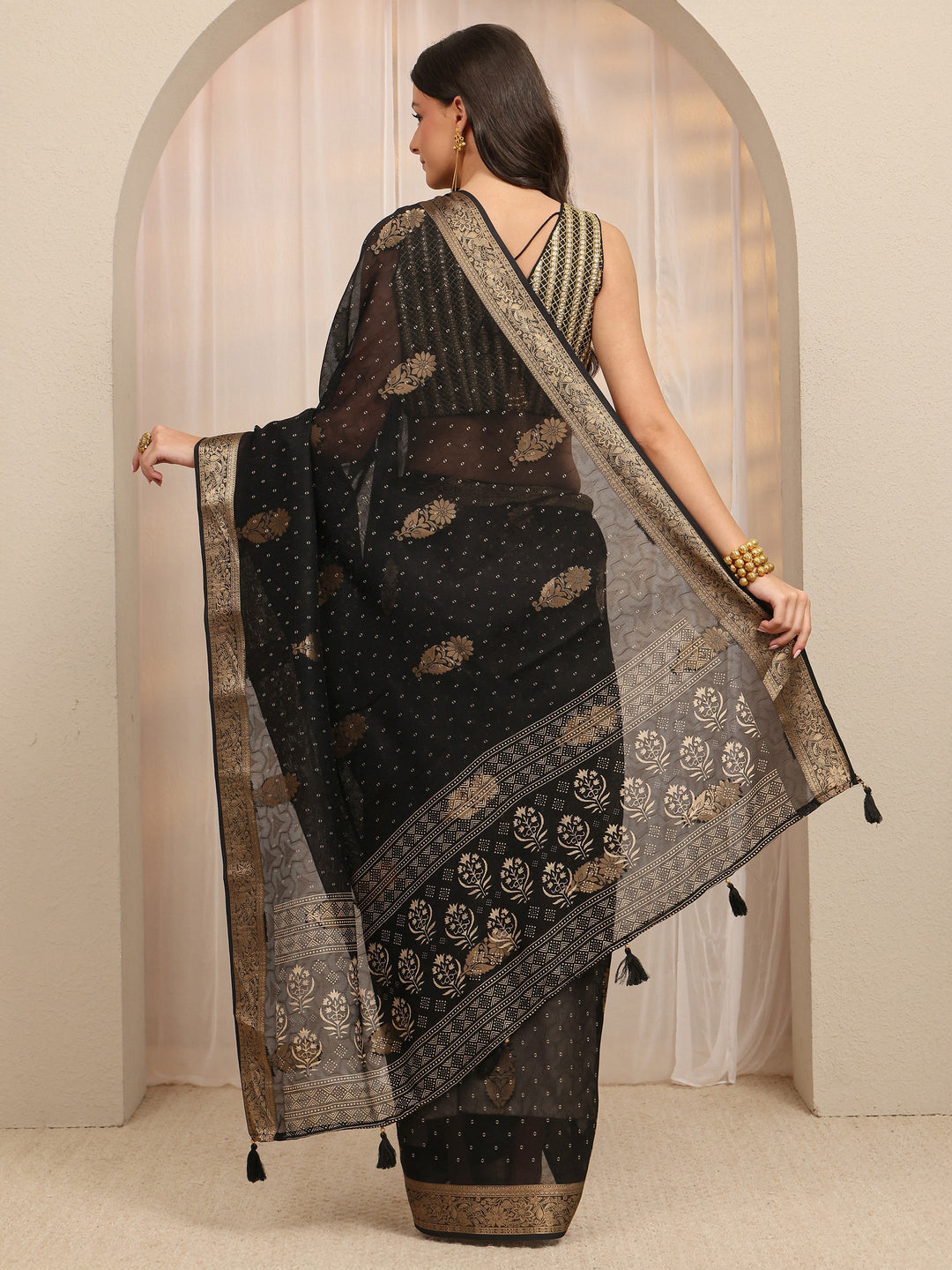 Black Floral Embroidered Silk Blend Saree
With Unstitched Blouse Piece