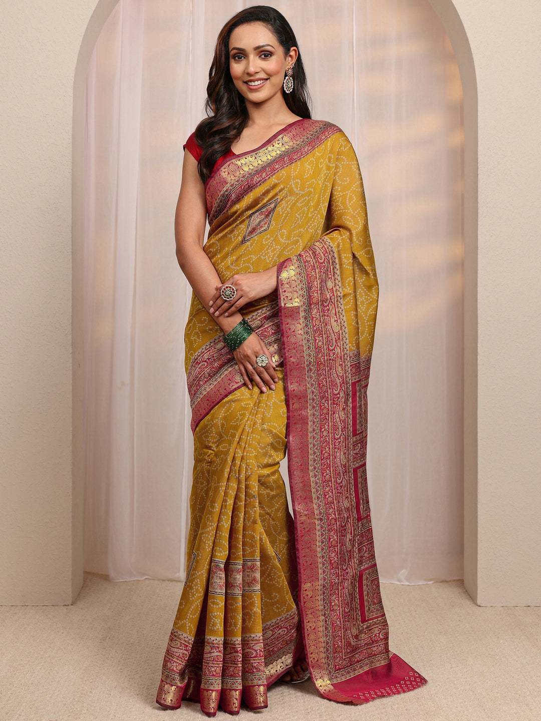 Mustard Bandhani Printed Silk Blend Saree 
With Unstitched Blouse Piece