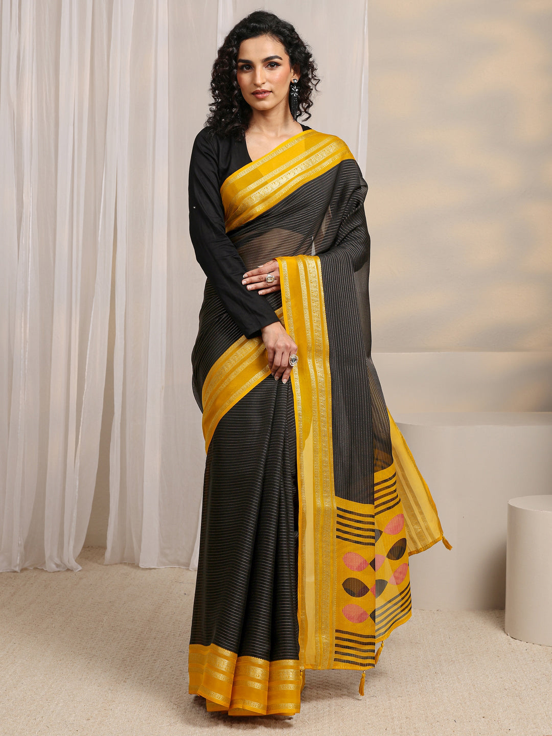 Black Printed Silk Blend Saree 
With Unstitched Blouse Piece