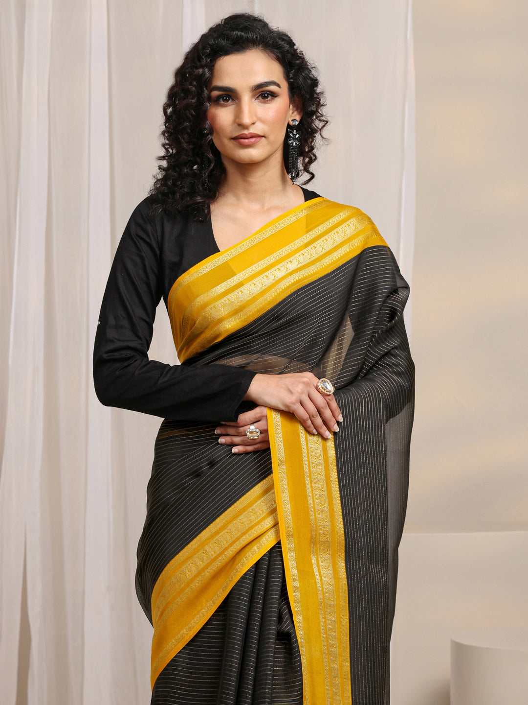 Black Printed Silk Blend Saree 
With Unstitched Blouse Piece