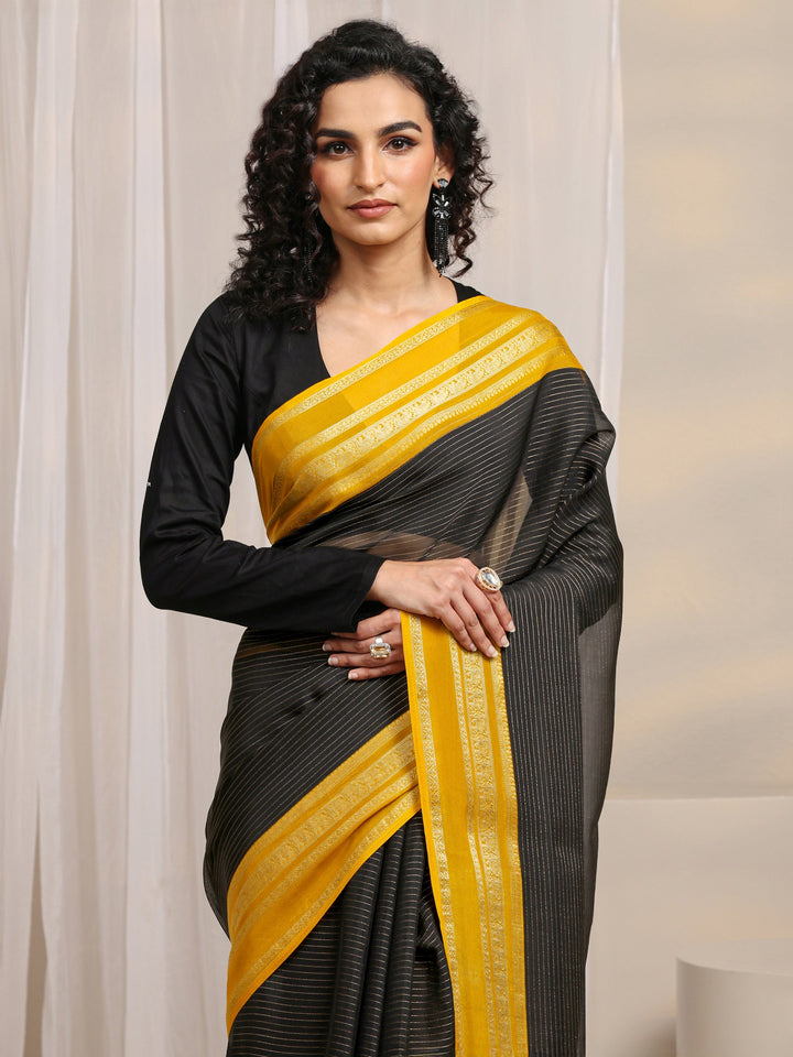 Black Printed Silk Blend Saree 
With Unstitched Blouse Piece