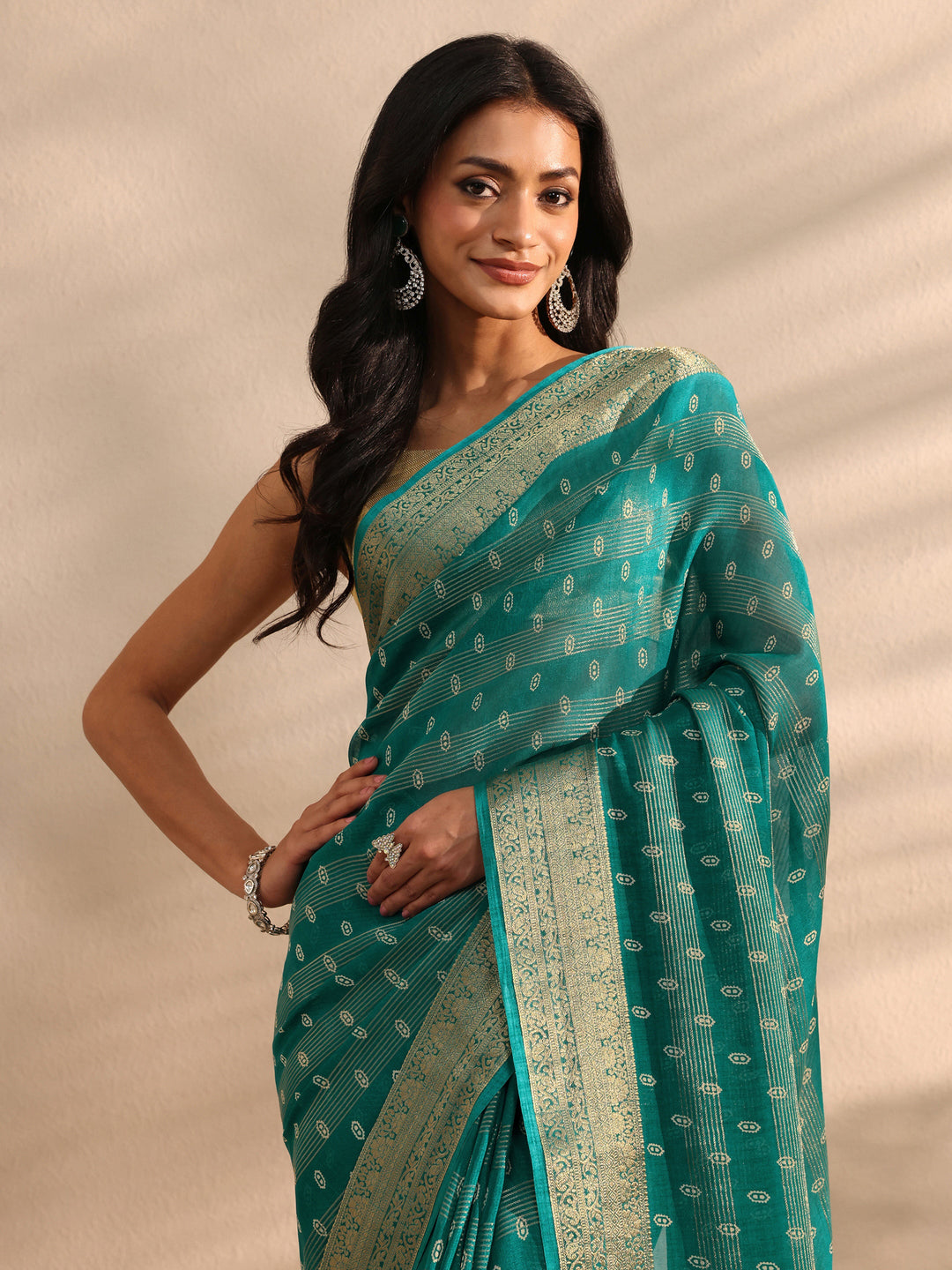 Green Ethnic Woven Silk Blend Saree 
With Unstitched Blouse Piece