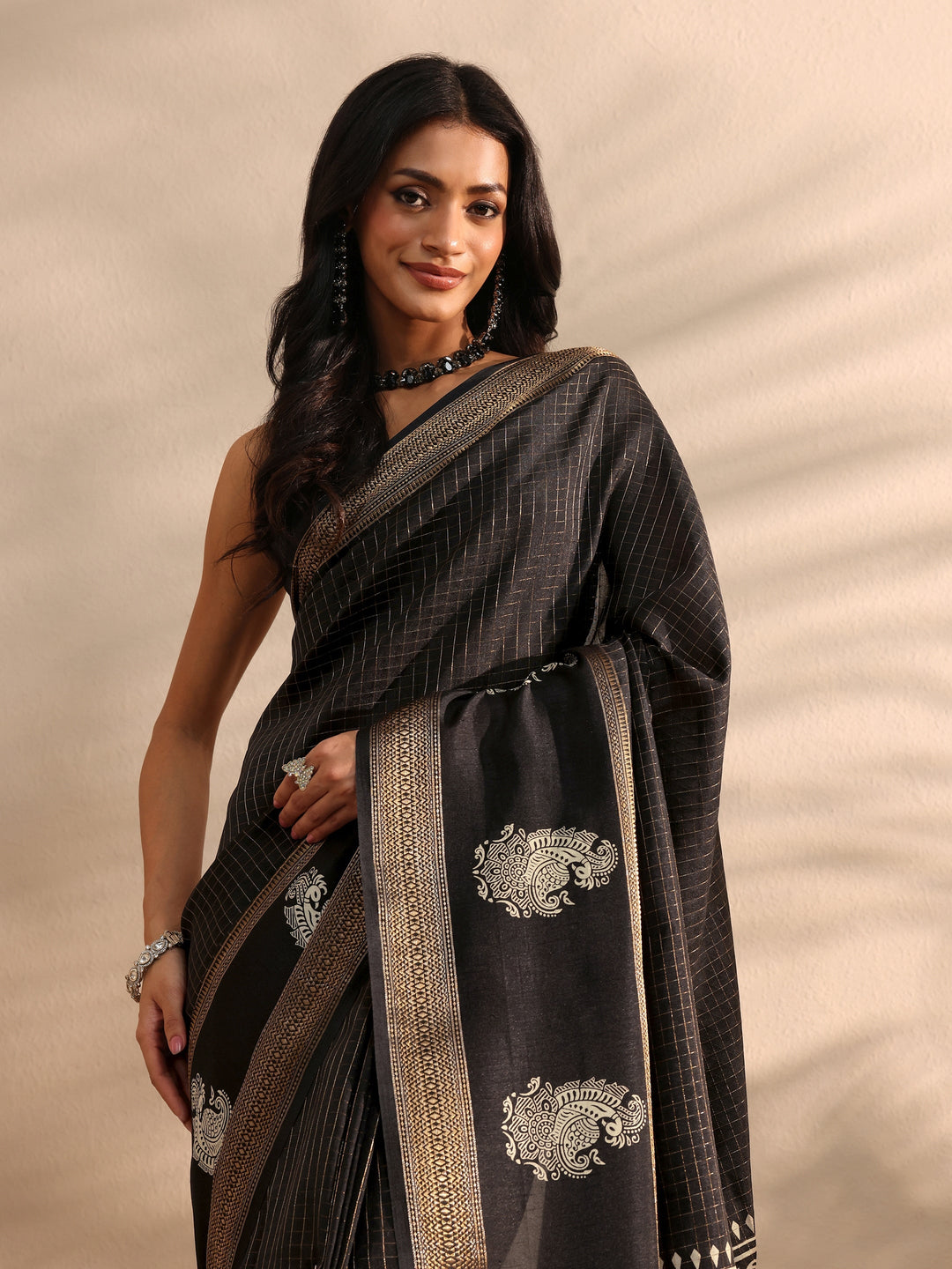 Black Printed Silk Blend Saree 
With Unstitched Blouse Piece