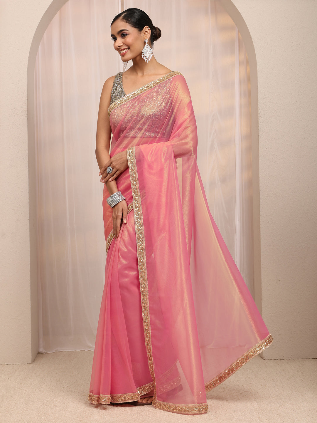 Coral Embellished Sheen Net Saree 
With Unstitched Blouse Piece