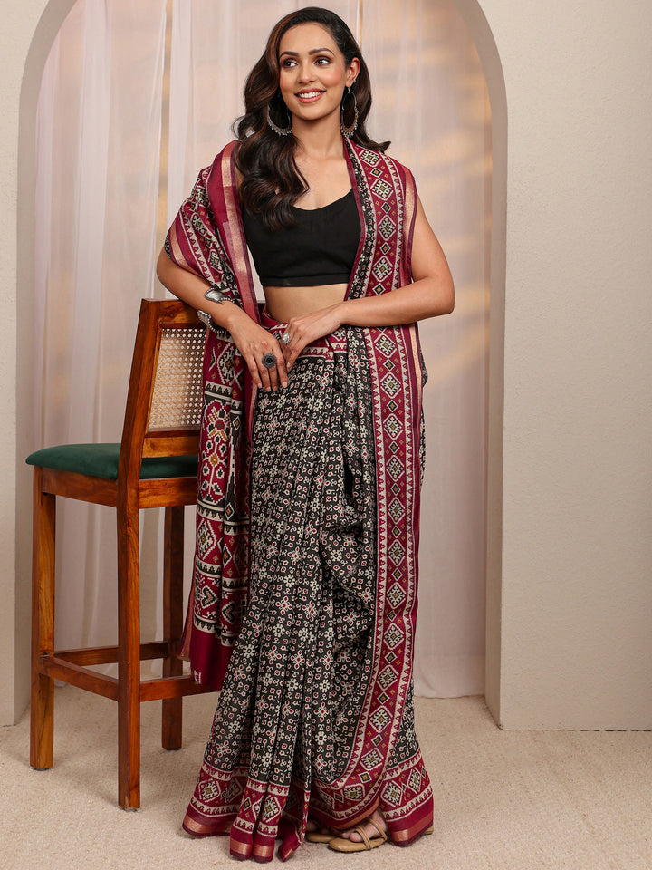 Black Ethnic Motif Printed Silk Blend Saree 
With Unstitched Blouse Piece