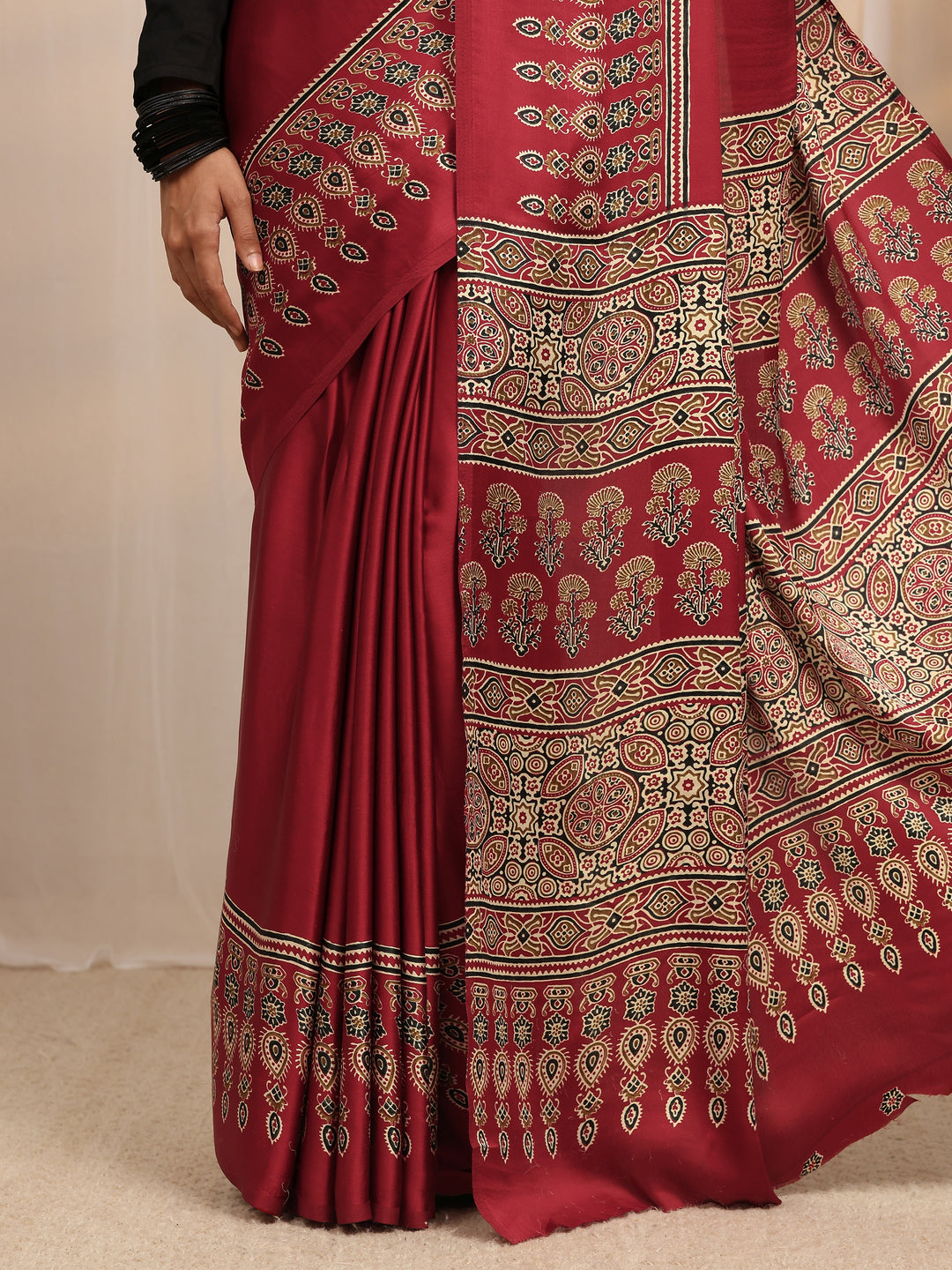 Maroon Ajrakh Printed Silk Blend Saree 
With Unstitched Blouse Piece