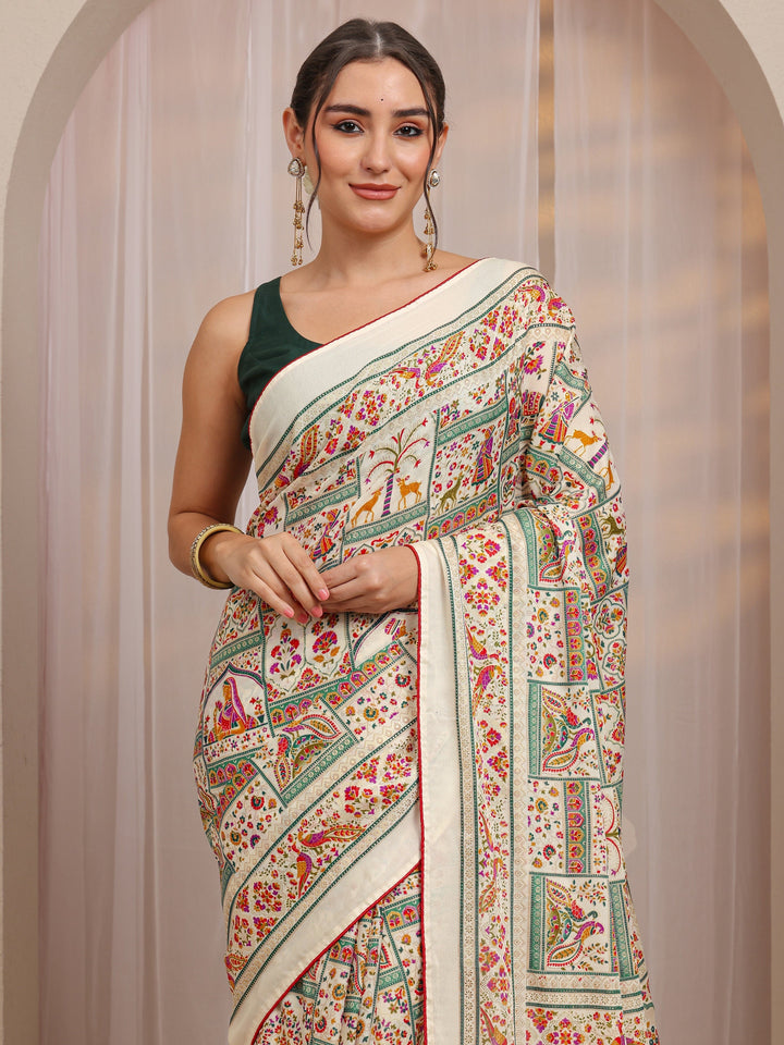 Ivory Ethnic Motifs Printed Silk Blend Saree
With Unstitched Blouse Piece