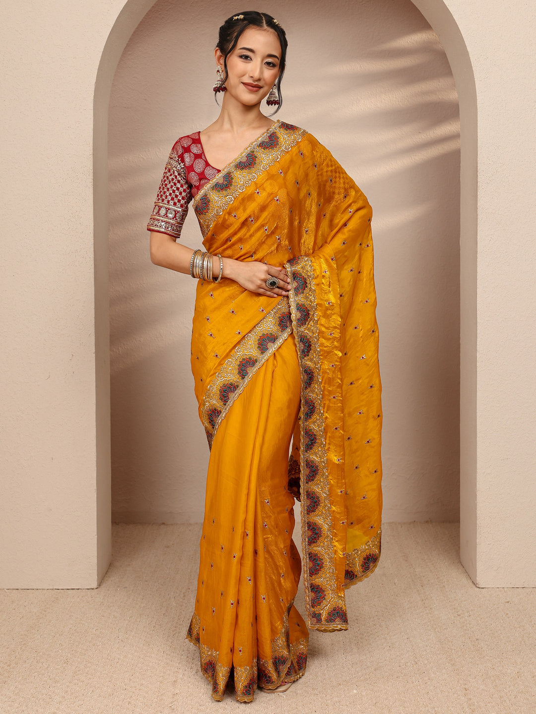 Mustard Ethnic Motif  Embroidered Silk Blend Saree With Unstitched Blouse Piece