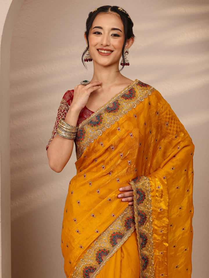 Mustard Ethnic Motif  Embroidered Silk Blend Saree With Unstitched Blouse Piece