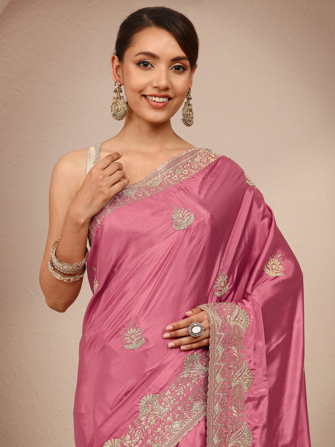 Mauve Ethnic Embroidered Silk Blend Saree
With Unstitched Blouse Piece