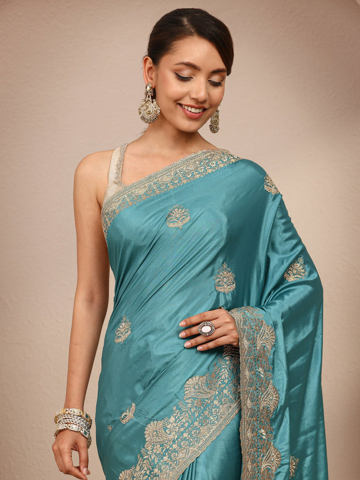 Blue Ethnic Embroidered Silk Blend Saree
With Unstitched Blouse Piece