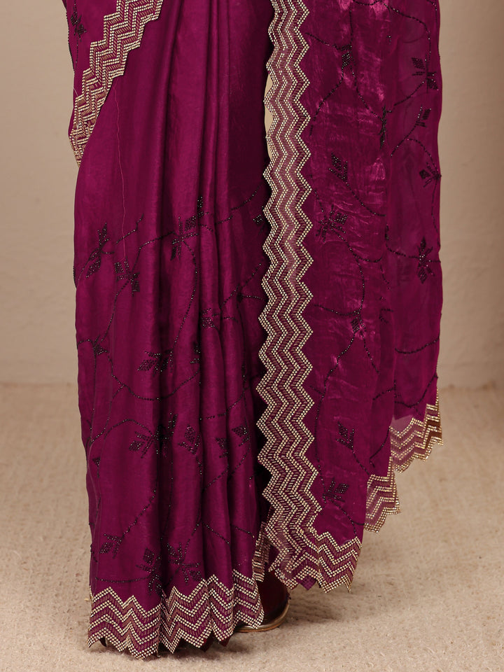 Magenta Embellished Silk Blend Saree
With Unstitched Blouse Piece