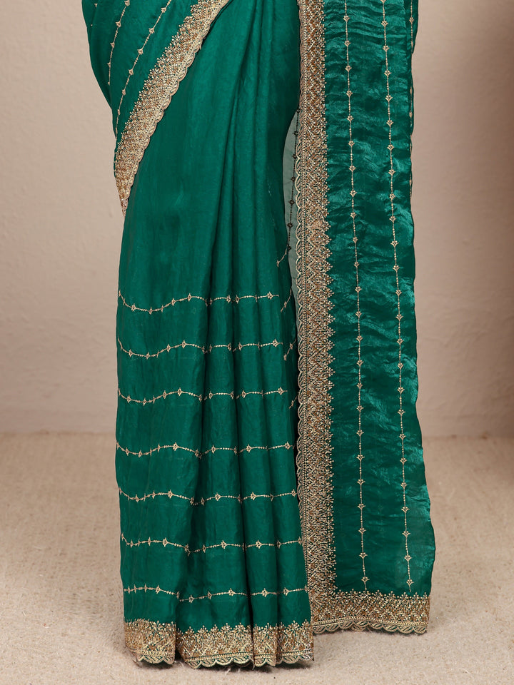 Green Embellished Silk Blend Saree
With Unstitched Blouse Piece