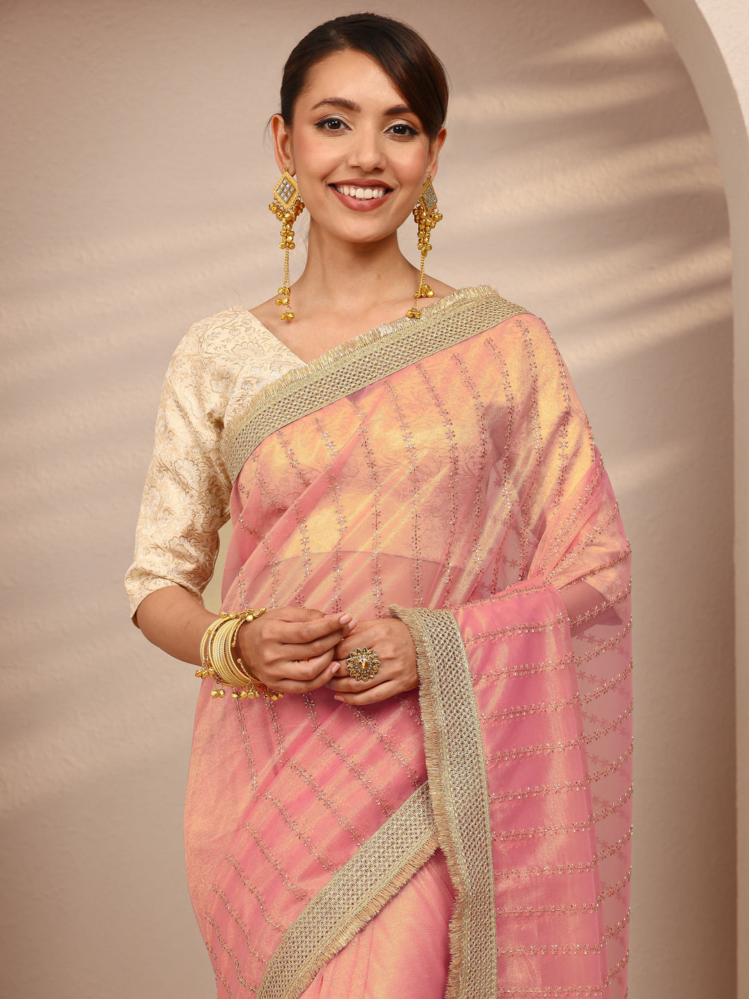 Pink Embellished Silk Blend Saree
With Unstitched Blouse Piece