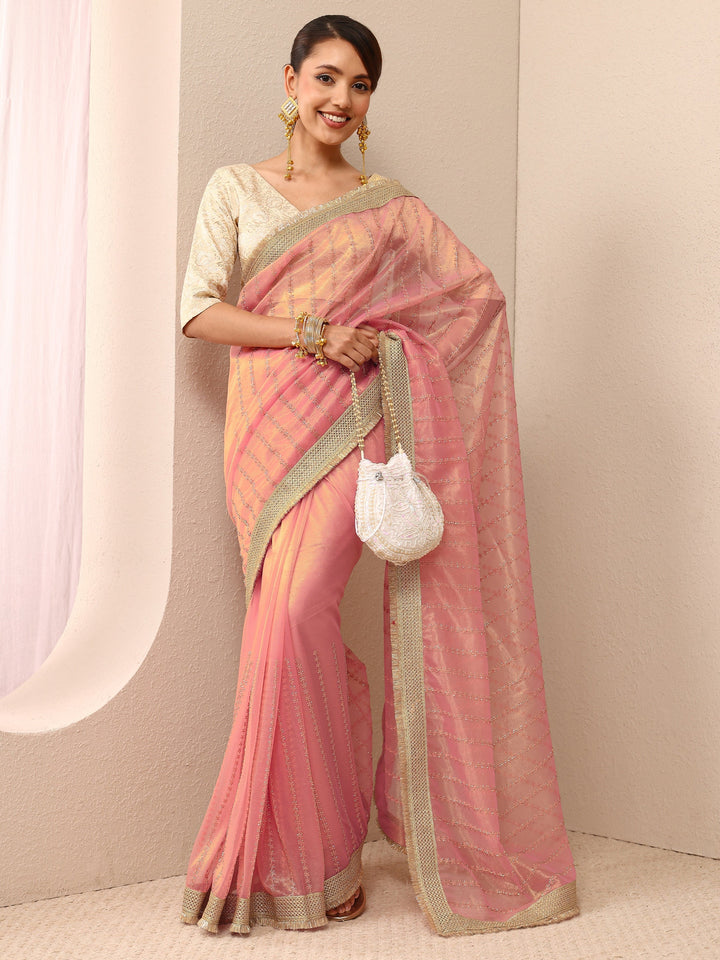 Pink Embellished Silk Blend Saree
With Unstitched Blouse Piece
