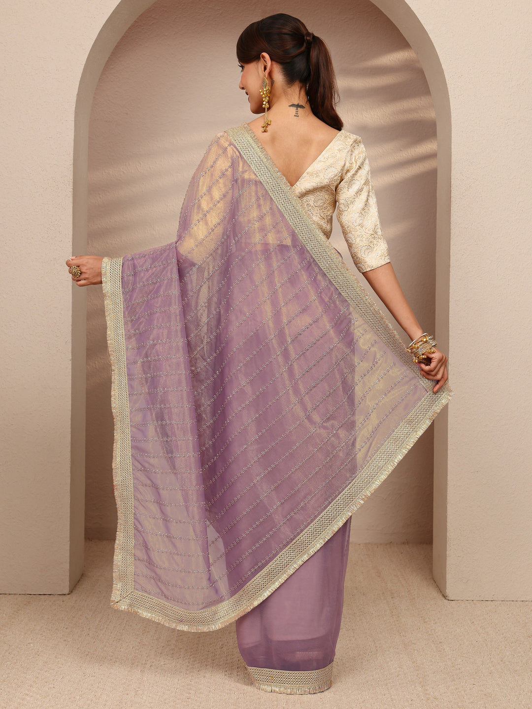 Lavender Embellished Silk Blend Saree
With Unstitched Blouse Piece