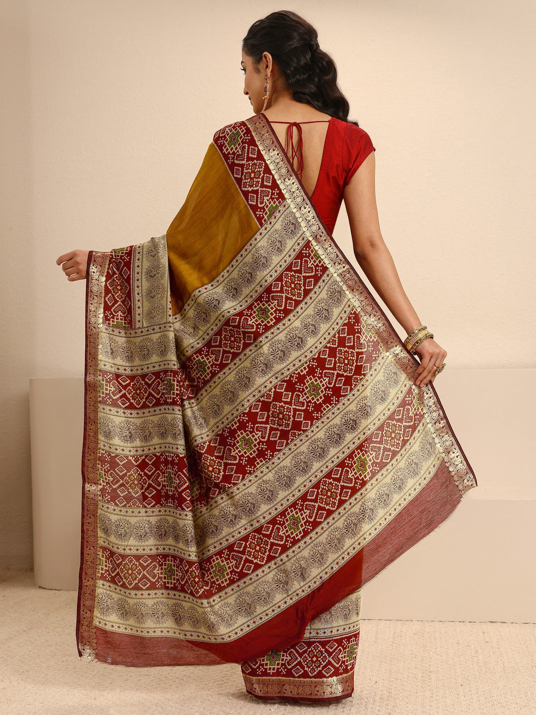 Mustard Silk Blend Patola Saree With Unstitched Blouse Piece