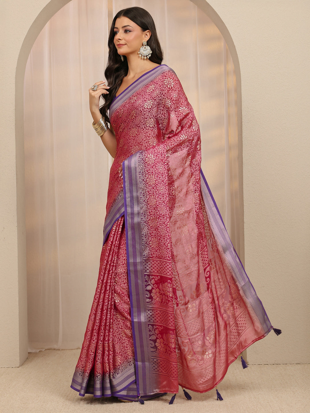 Pink Woven Design Silk Blend Saree 
With Unstitched Blouse Piece