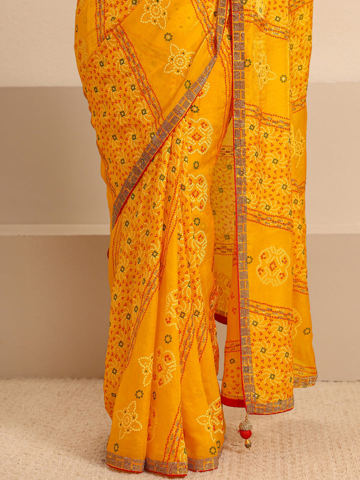 Mustard Bandhani Printed Silk Blend Saree With Unstitched Blouse Piece