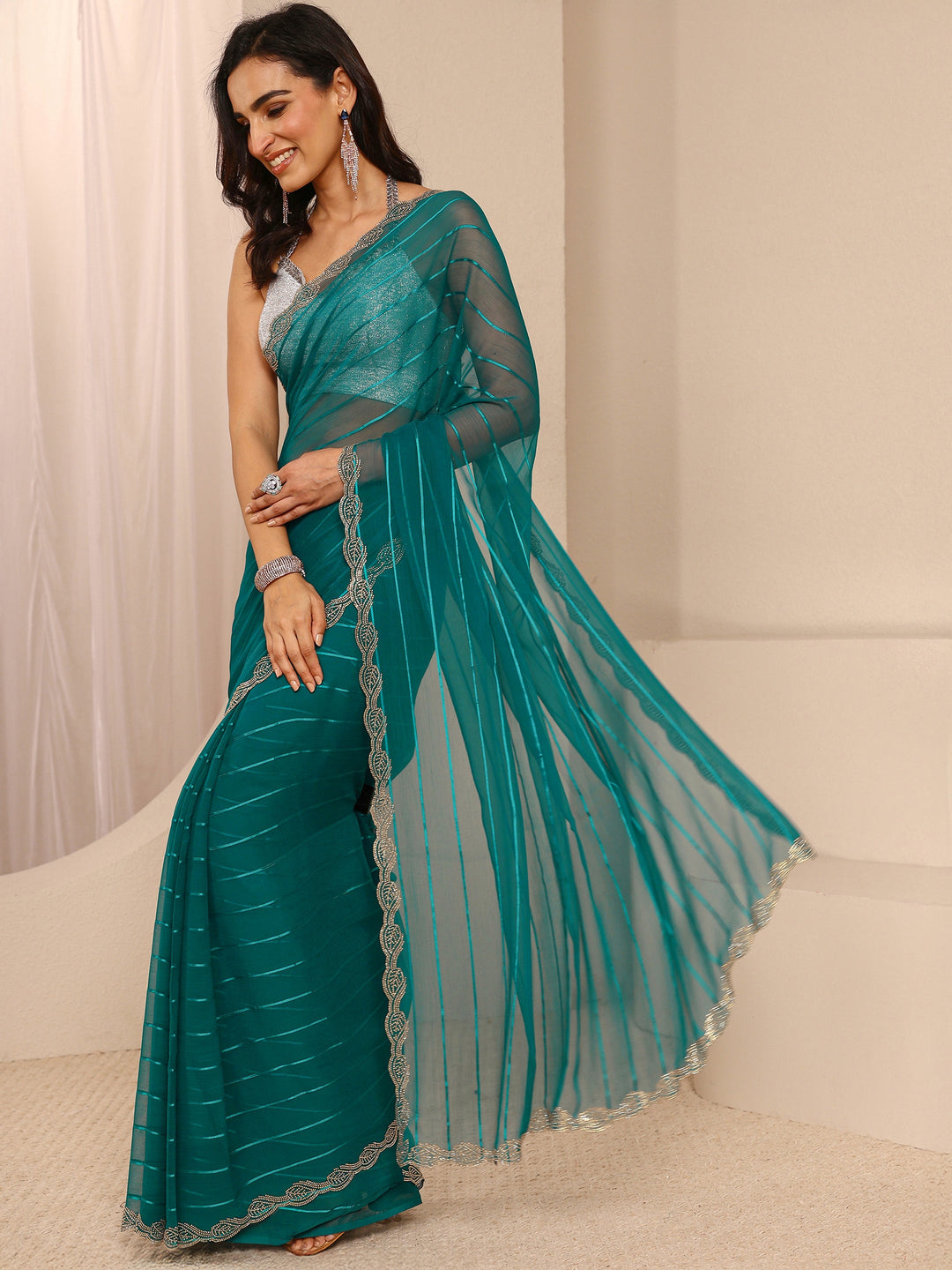 Teal Striped Embellished Silk Blend Saree With Unstitched Blouse Piece