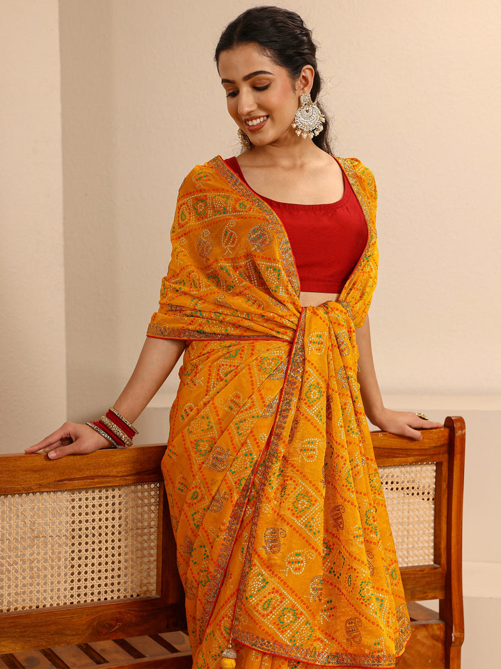 Mustard Bandhani Printed Silk Blend Saree With Unstitched Blouse Piece