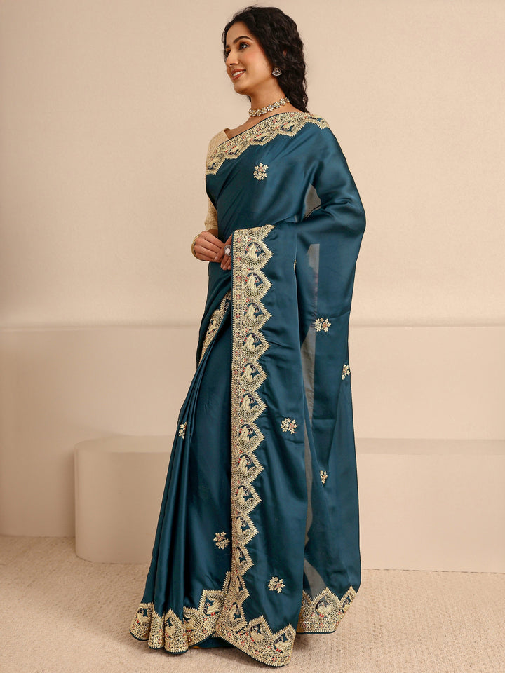 Libas Art Teal Embellished Silk Blend Saree With Unstitched Blouse Piece