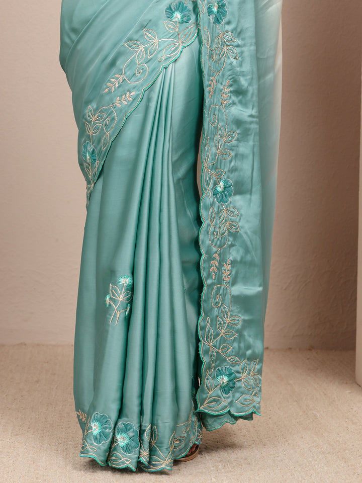 Blue Floral Embroidered Silk Blend Ombre Saree
With Unstitched Blouse Piece