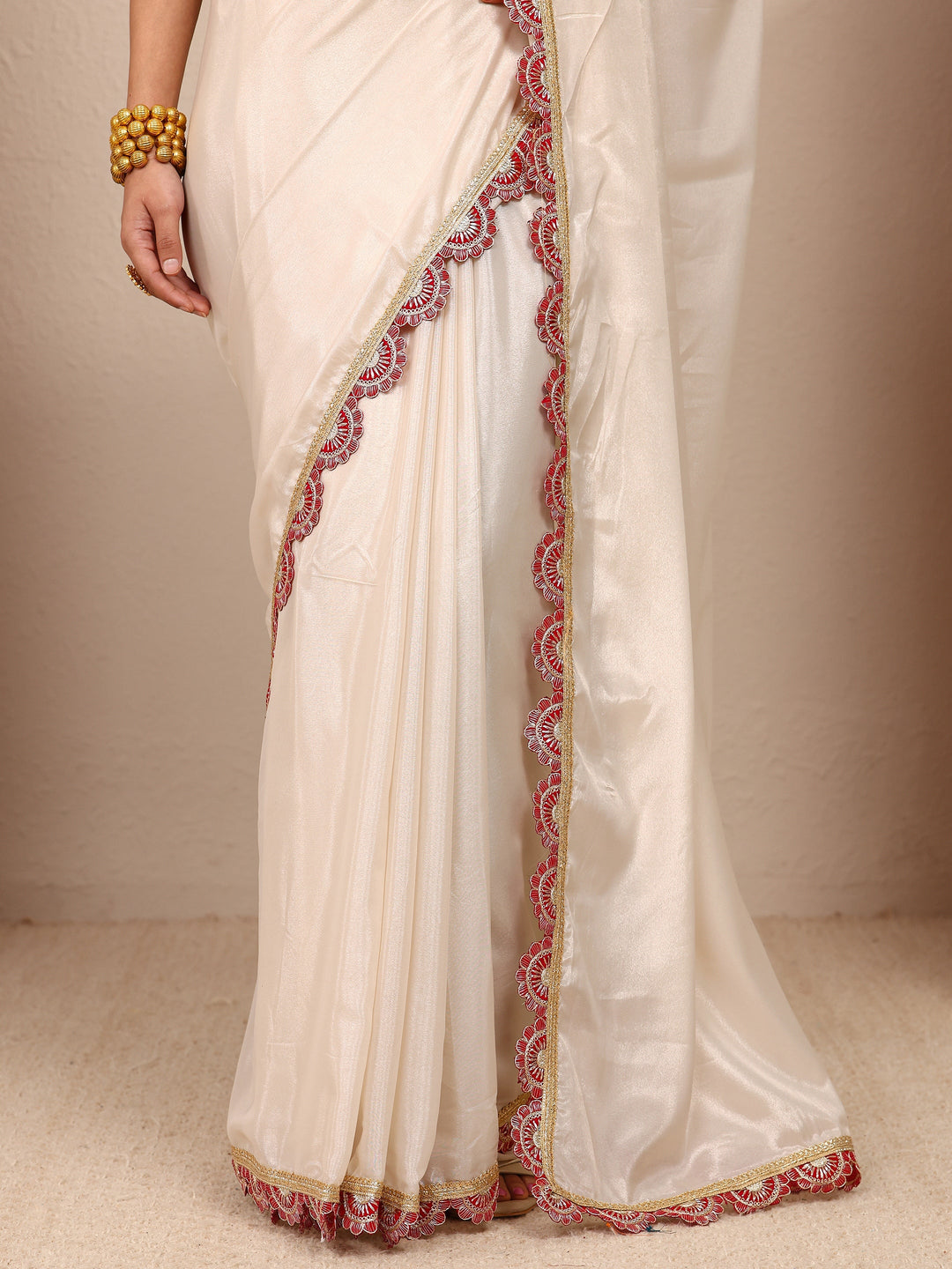 Cream Solid Tissue Saree With Unstitched Blouse Piece