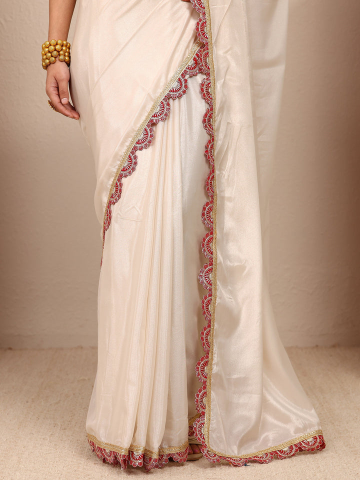 Cream Solid Tissue Saree With Unstitched Blouse Piece