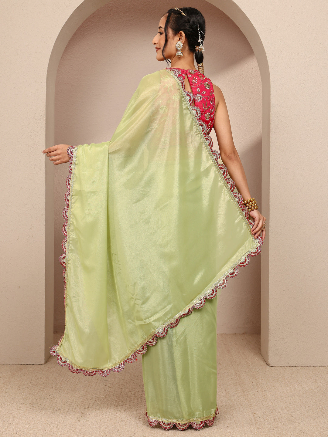 Green Solid Tissue Saree With Unstitched Blouse Piece