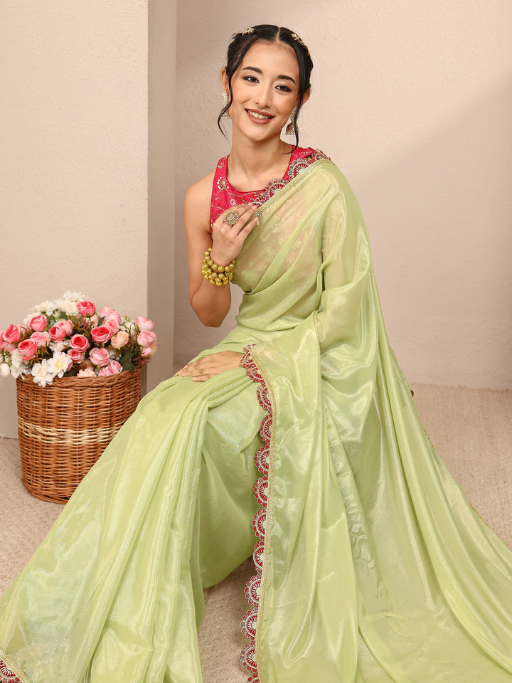 Green Solid Tissue Saree With Unstitched Blouse Piece