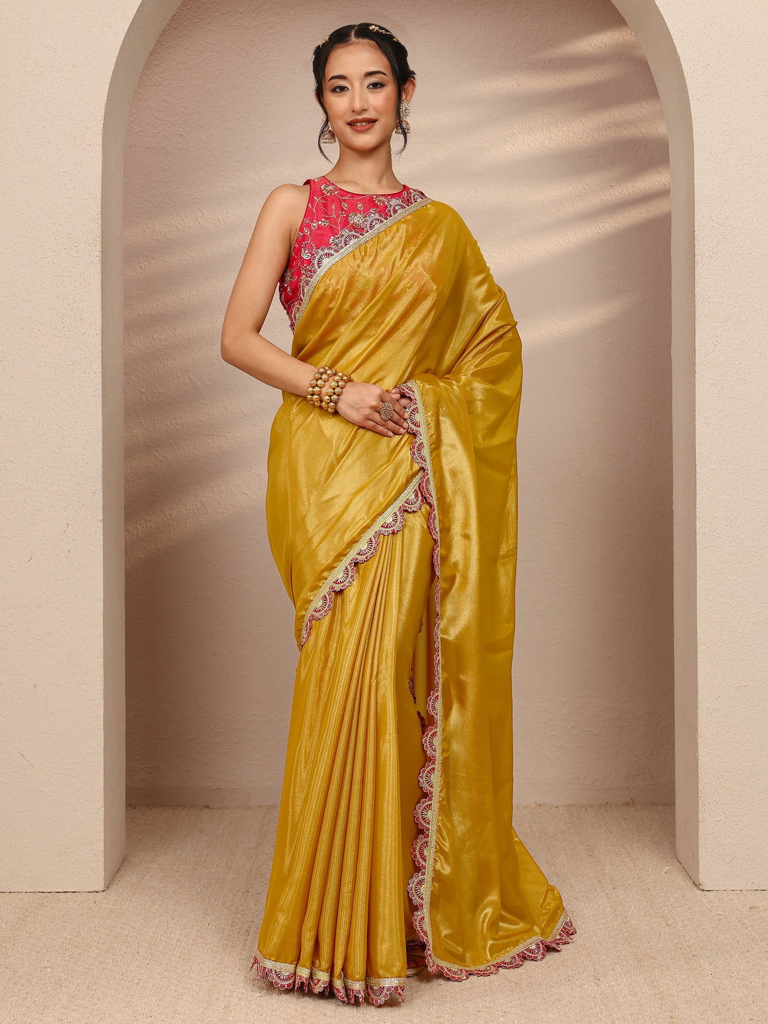 Mustard Solid Tissue Saree With Unstitched Blouse Piece