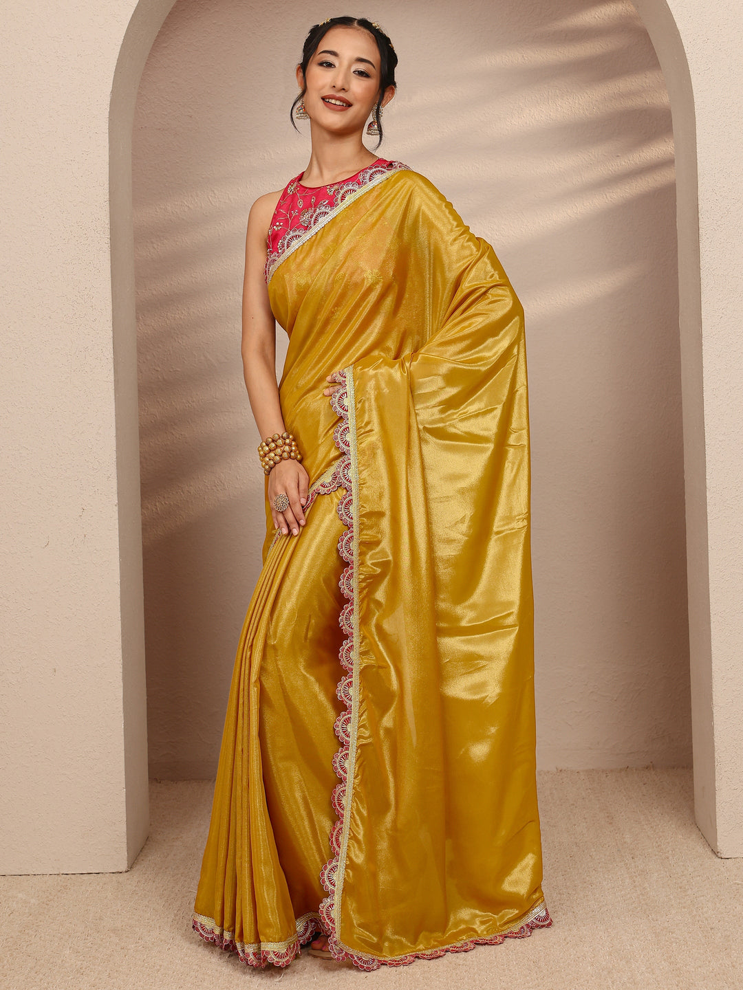 Mustard Solid Tissue Saree With Unstitched Blouse Piece
