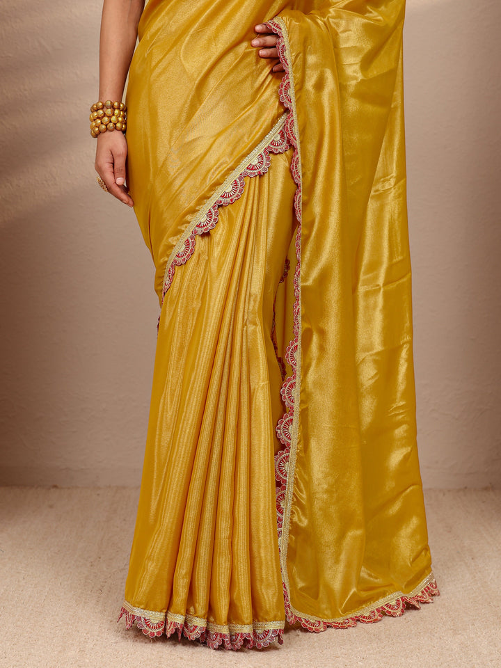 Mustard Solid Tissue Saree With Unstitched Blouse Piece