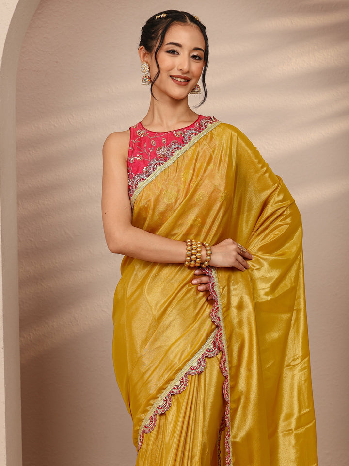 Mustard Solid Tissue Saree With Unstitched Blouse Piece