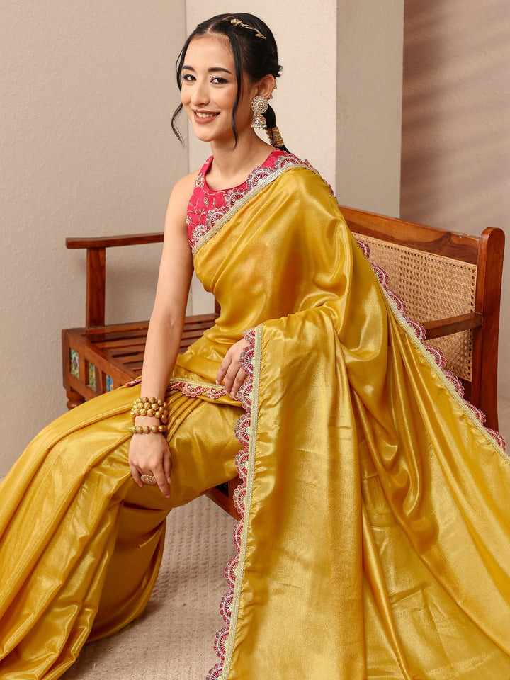 Mustard Solid Tissue Saree With Unstitched Blouse Piece