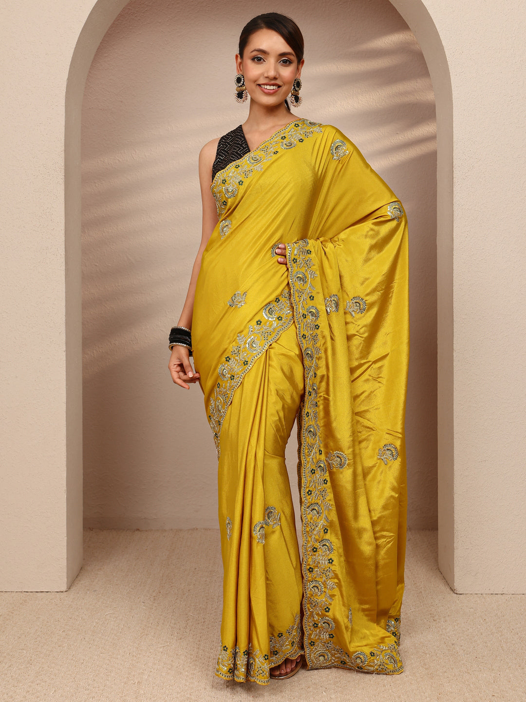 Mustard Floral Embroidered Satin Saree
With Unstitched Blouse Piece