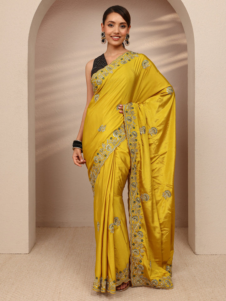 Mustard Floral Embroidered Satin Saree
With Unstitched Blouse Piece