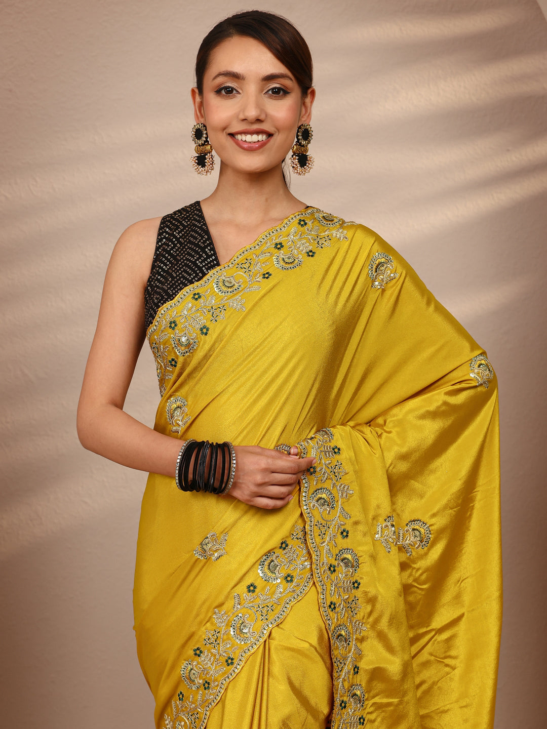 Mustard Floral Embroidered Satin Saree
With Unstitched Blouse Piece