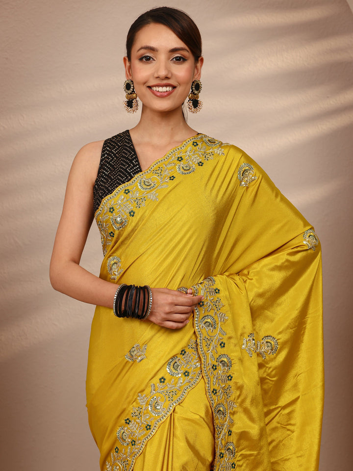 Mustard Floral Embroidered Satin Saree
With Unstitched Blouse Piece