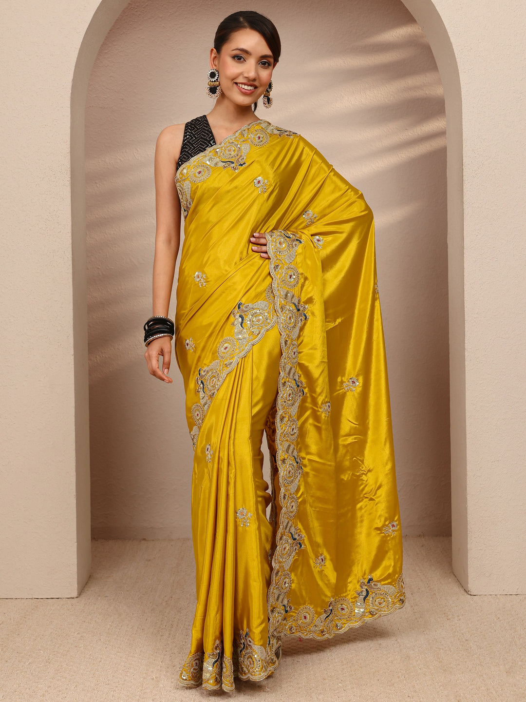 Mustard Floral Embellished Satin Saree
With Unstitched Blouse Piece