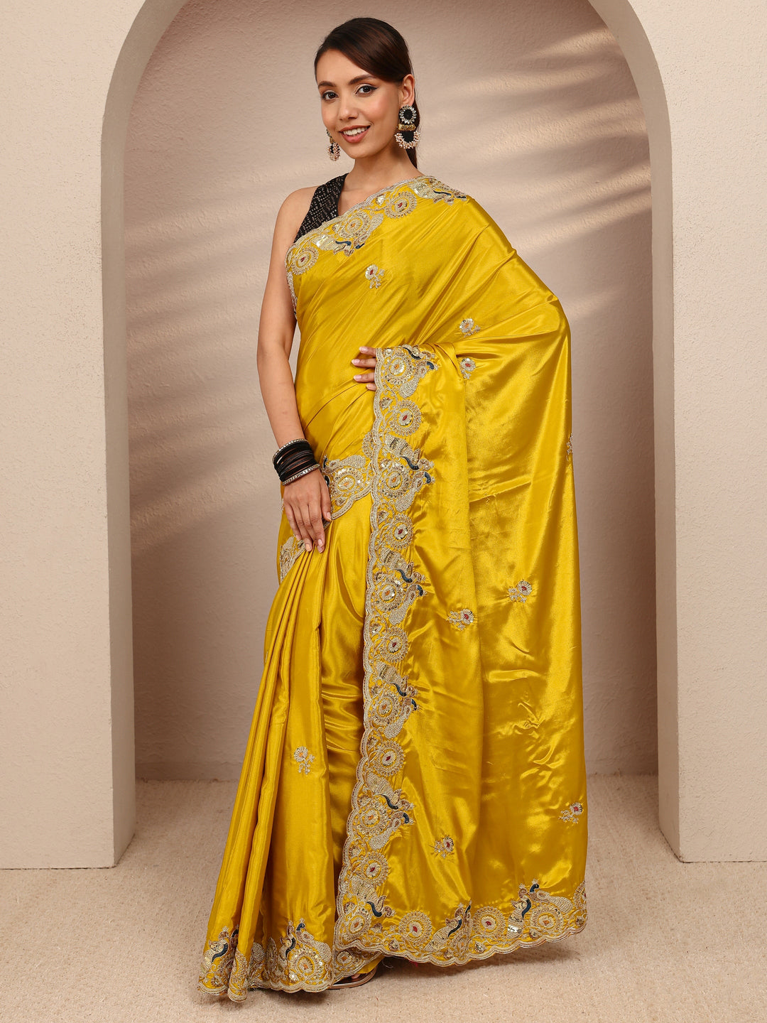 Mustard Floral Embellished Satin Saree
With Unstitched Blouse Piece