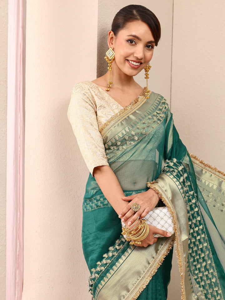 Green Woven Design Chanderi Silk Saree
With Unstitched Blouse Piece