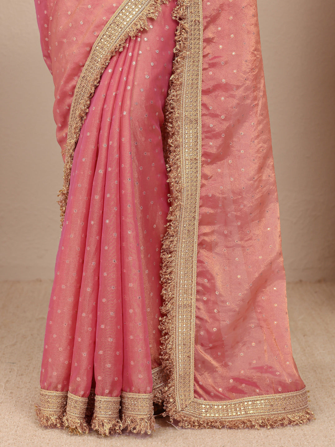 Pink Woven Design Tissue Saree
With Unstitched Blouse Piece