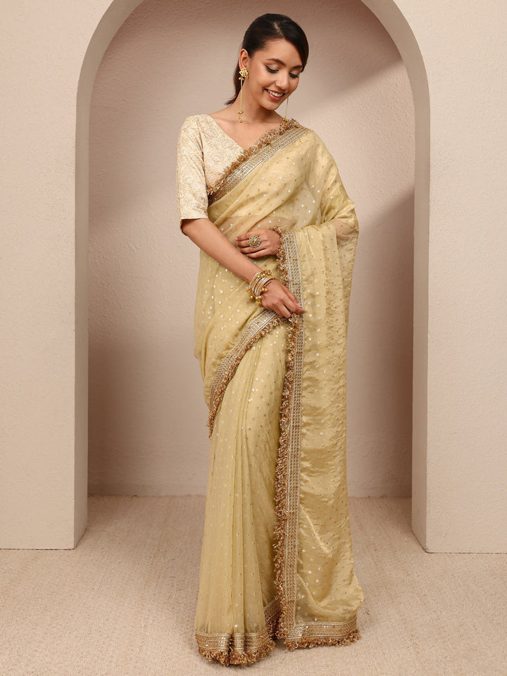 Gold Woven Design Tissue Saree
With Unstitched Blouse Piece