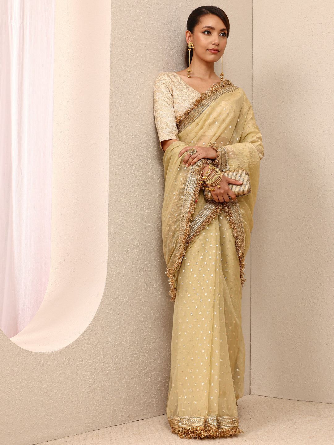 Gold Woven Design Tissue Saree
With Unstitched Blouse Piece