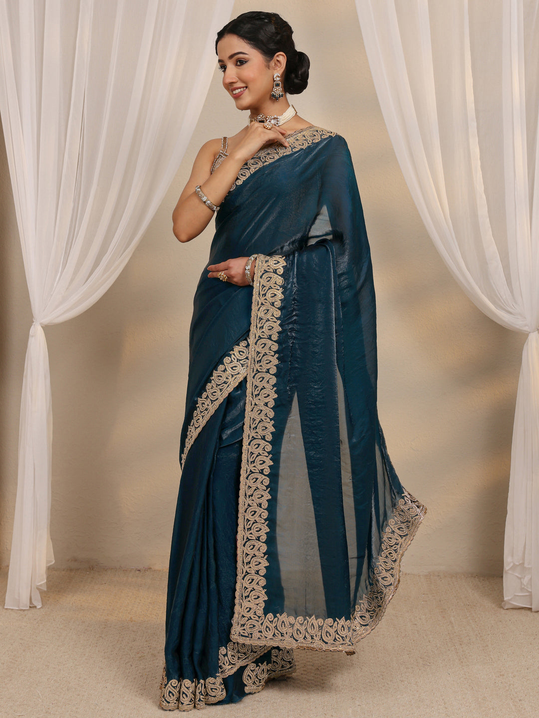 Teal Embellished Tissue Saree With Unstitched Blouse Piece