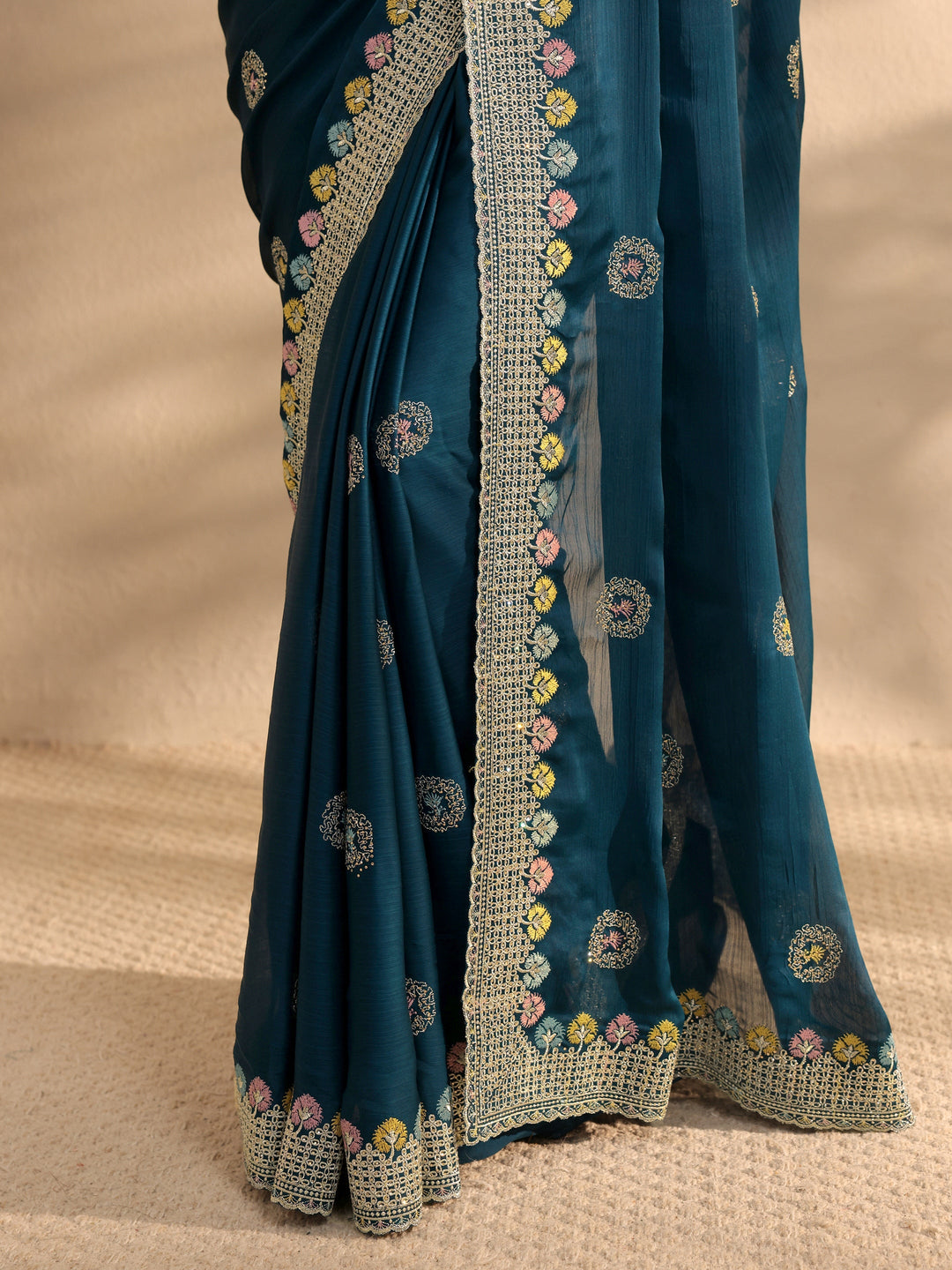 Teal Embellished Satin Sareewith Unstitched Blouse Piece