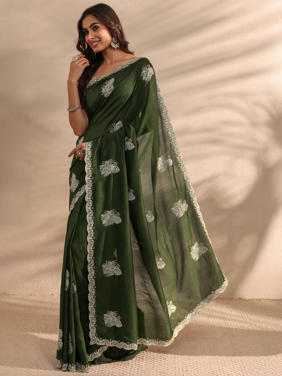 Green Embellished Silk Blend Saree 
With Unstitched Blouse Piece