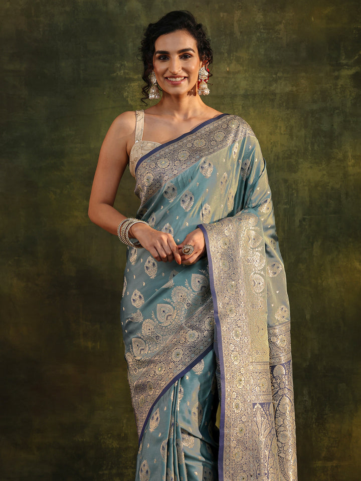 Teal Woven Design Silk Blend Banarasi Saree With Unstitched Blouse Piece